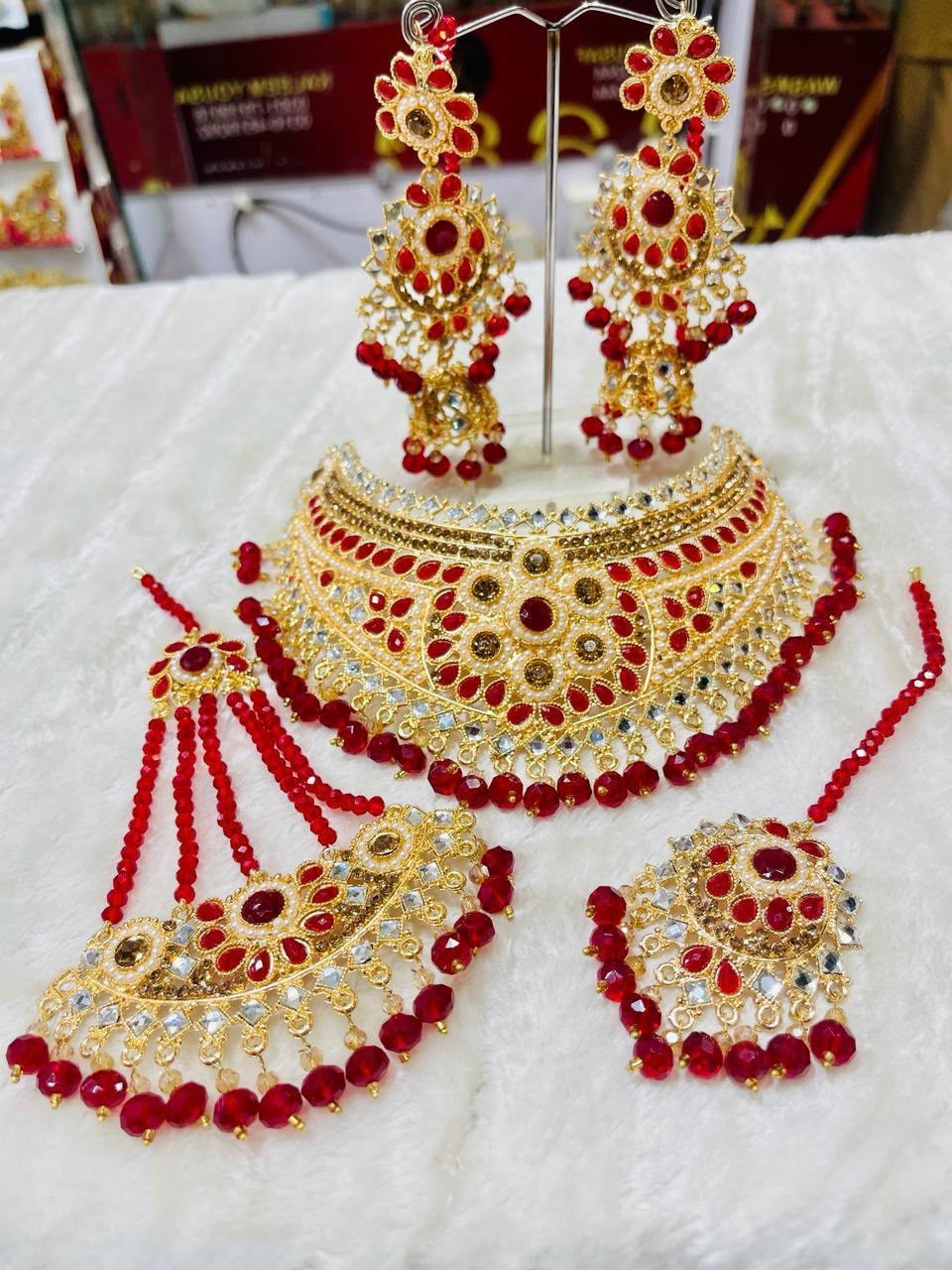 Luxury Ruby Bridal Jewelry Set with Choker Necklace, Earrings, Maang Tikka & Hathphool